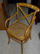 A set of six Oka style stained beech cane seated bentwood kitchen chairs CONDITION