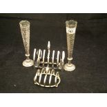 A silver four section toast rack of oval form (by George Unite, Birmingham, 1925),