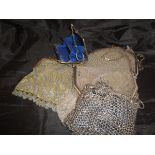 A collection of five plated/white metal and chain mail and other evening purses/bags