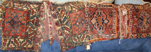 Two tribal Caucasian saddle bags, each of red,