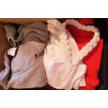 A box containing a collection of Red Valentino jumpers,