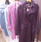 A Burberry purple trench coat,