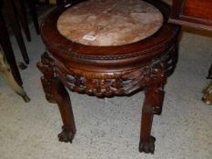 An early 20th Century rosewood framed rosso marble topped jardiniere stand