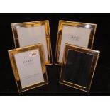 A pair of modern silver photograph frames with gadrooned edge decoration (by Carrs of Sheffield Ltd,