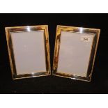 A pair of modern silver photograph frames with reeded and ribbon decoration (by Carrs of Sheffield