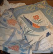 A box of vintage linens to include tablecloth, cushion covers, etc,
