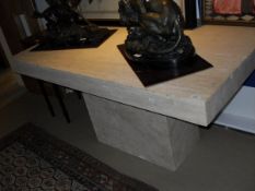 A Travertine rectangular centre table on a pillar support,