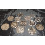 WITHDRAWN - A collection of twelve commemorative £5.00 coins and a commemorative £2.