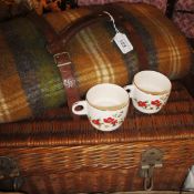 A wicker picnic hamper with fitted contents to include Brexton's teacups, etc,