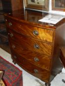 A Victorian mahogany bow front chest of drawers the plain top above four long graduated drawers