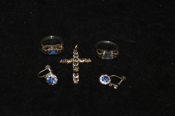 A collection of costume jewellery comprising two stone set dress rings,