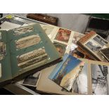 Five albums and contents of various postcards and tourist photographs,