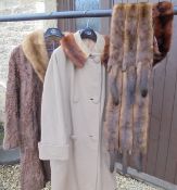 A ladies fawn coloured coat with mink collar, labelled "Crayson of London" to the interior,