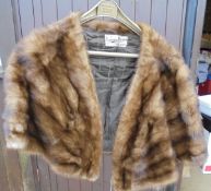 A mink fur collar labelled "Seymour Kearney 55A Sloane Square" to the interior