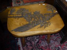 A carved elm table featuring Shire horses,