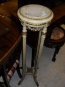 A marble top and painted torchere in the Louis XVI manner,