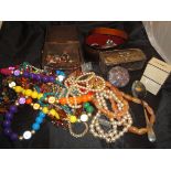 A box containing various costume jewellery, dressing table box with silver top,