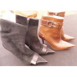 A pair of Dior black suede and leather ankle boots, size 37,