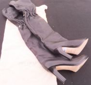 A pair of Jimmy Choo black leather over the knee boots,