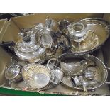 A box containing assorted plated wares to include a three piece tea set etc together with a three