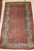 A Serabend rug,