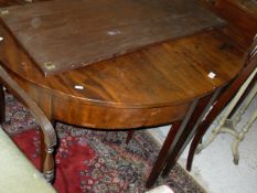 An early 19th Century mahogany D-end dining table,