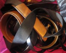 A box of assorted leather belts, gloves, etc to include Berluti, Dunhill,