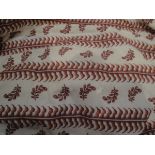 Two pairs of cotton interlined curtains, the plain ground with red stripe and leaf spray design,