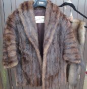 A mink fur stole with label inscribed "Siberian Fur Stores, Kowloon Hong Kong",