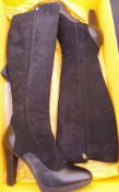 A pair of Fendi black suede and leather knee high boots, with box,