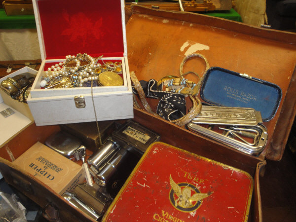 A box containing jewellery casket and various costume jewellery, necklaces, bracelets,