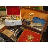 A box containing jewellery casket and various costume jewellery, necklaces, bracelets,