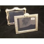 A modern silver photograph frame with beaded gadrooned embossed decoration (by Carrs of Sheffield