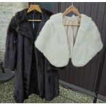 A full length mink coat with satin lining inscribed "Marjorie",