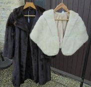 A full length mink coat with satin lining inscribed "Marjorie",