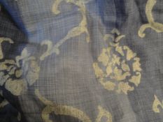 A pair of cotton interlined Osbourne and Little "Villa Rosa" blue and cream curtains with a pair of