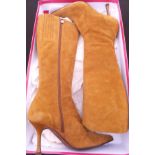 A pair of Escada tan suede knee high boots, with box,