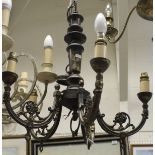 A modern patinated metal framed five branch electrolier in the Continental Art Deco style and a