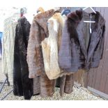 A fur jacket with three quarter length sleeves inscribed "EMF" to the interior,