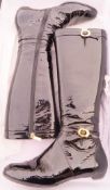 A pair of Jimmy Choo "Joy" patent leather boots, with box,