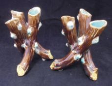 A pair of circa 1900 Continental majolica glazed pottery vases as three branches entwined