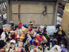 A suitcase of various costume dolls and a small bag of costume jewellery CONDITION