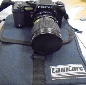 A Pentax 35mm A3 Date camera and accessories in case,