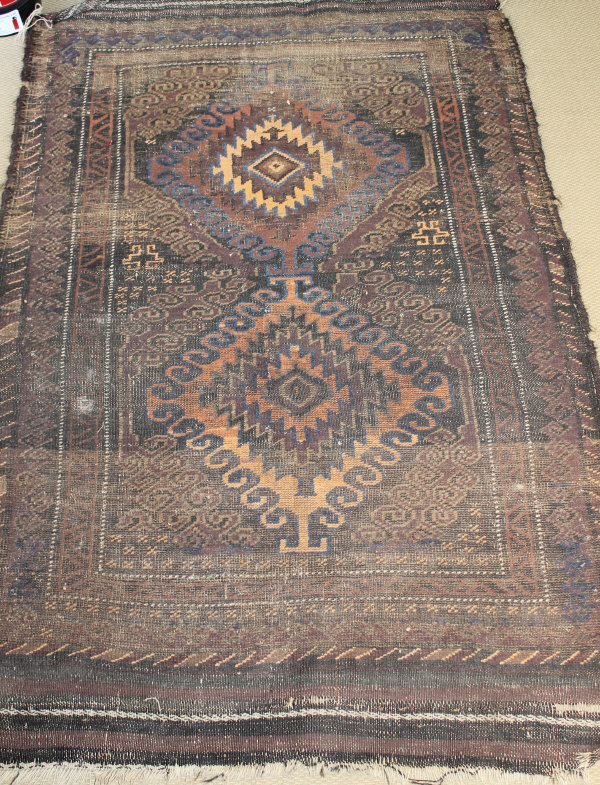 A Turkish style rug, the central panel set with various geometric patterns on a teal ground, - Image 2 of 2
