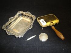 A Victorian silver bonbon dish of rectangular form with pierced edges and C scrolling decoration