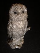 A modern silver Country Artists figure of an owl raised on a branch