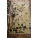 A Chinese silk rug, the central panel set with scene of birds amongst branches and blossoms,