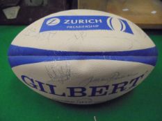 A Gilbert signed rugby ball (possibly Bath) and a pair of vintage gents brown leather shoes,
