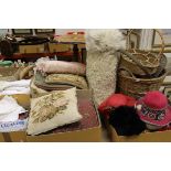 A collection of textiles, cushions, baskets, hats, etc,