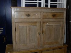 A pine dresser with two drawers over two cupboard doors together with two painted bar back kitchen
